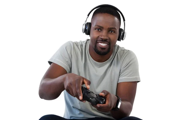 Hombre con joystick jugando videojuego — Foto de Stock