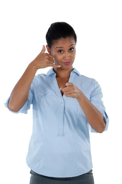 Businesswoman pretending to talk on phone — Stock Photo, Image