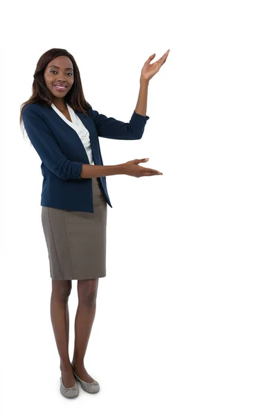 Mujer de negocios gesto durante la presentación — Foto de Stock