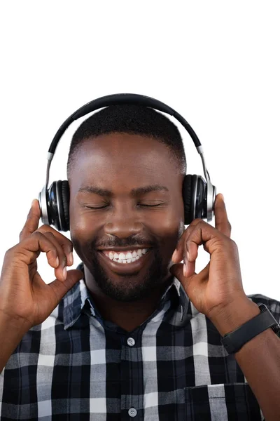 Férfi zenét hallgat a fejhallgatón — Stock Fotó