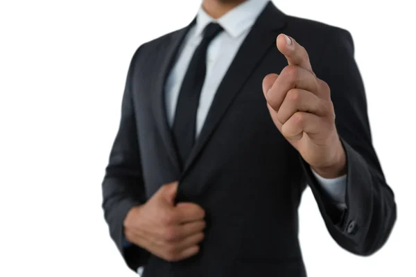 Confident businessman pointing — Stock Photo, Image