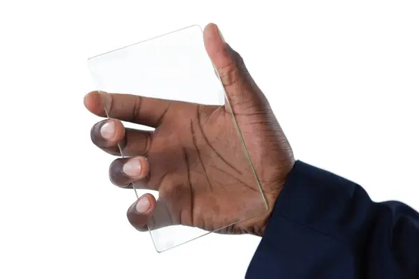 Businessman holding glass smartphone — Stock Photo, Image