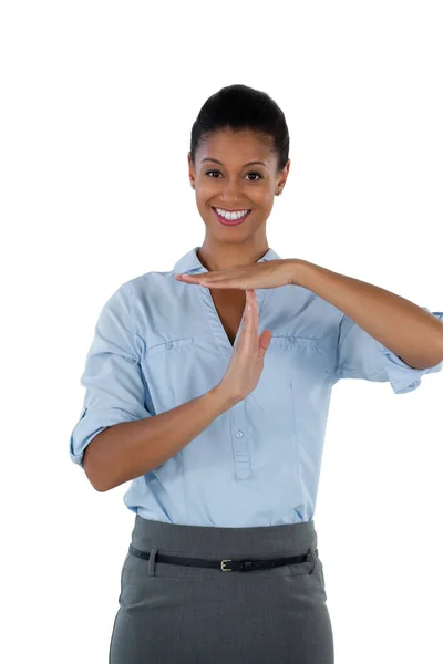 Mujer de negocios haciendo el gesto de la mano timeout — Foto de Stock