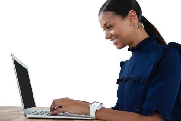 Businesswoman using laptop — Stock Photo, Image