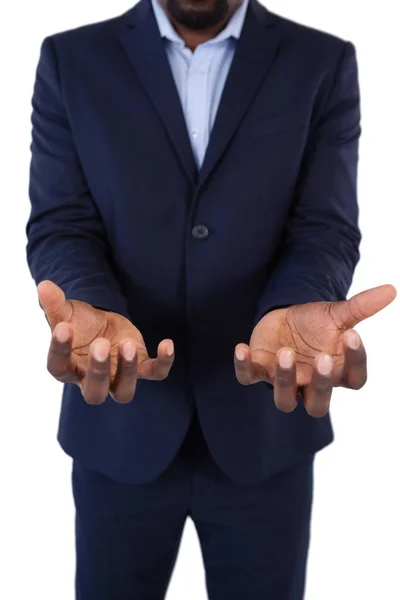 Bezmocný podnikatel ukazuje rukou — Stock fotografie