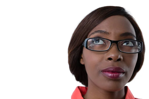 Woman with eyeglasses looking up — Stock Photo, Image