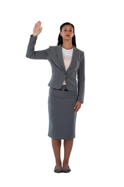 Femme d'affaires levant la main — Photo