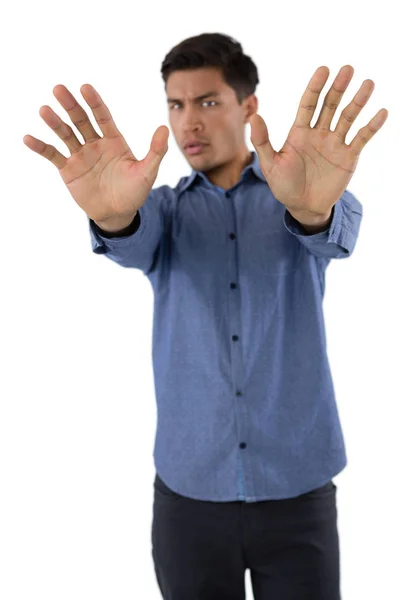 Young businessman gesturing — Stock Photo, Image