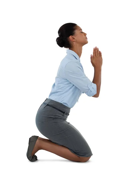 Worried businesswoman praying — Stock Photo, Image