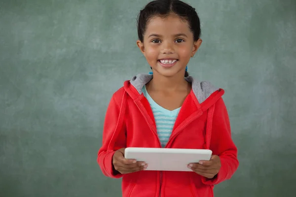 Young girl holding digital tablet — Stock Photo, Image