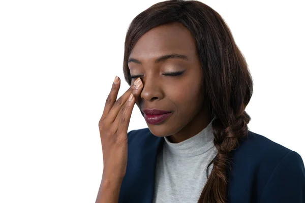 Mujer de negocios frotando los ojos —  Fotos de Stock