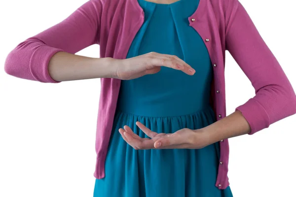 Teenage girl pretending to be hold invisible object — Stock Photo, Image