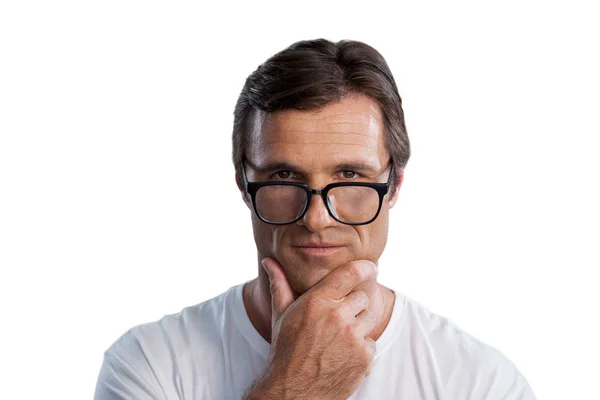 Close up portrait of mature man with hand on chin — Stock Photo, Image