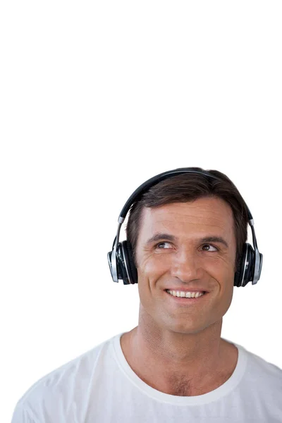 Happy mature man wearing headphones looking away — Stock Photo, Image