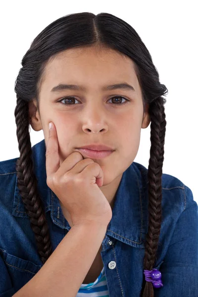 Girl with hand on chin — Stock Photo, Image