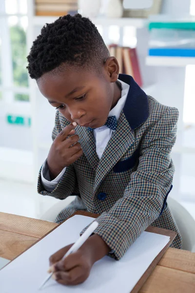 Black child writing Stock Photos, Royalty Free Black child writing