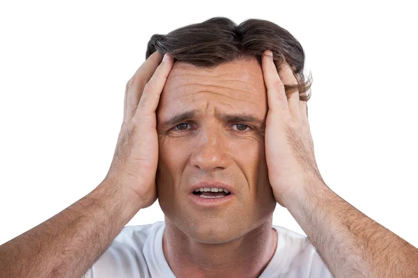 Close up of frustrated mature man with head in hand — Stock Photo, Image