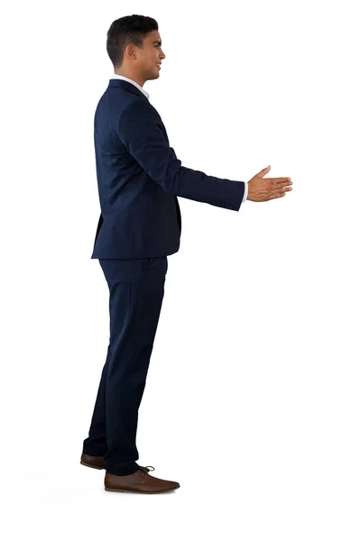 Hombre de negocios extendiendo brazos para apretón de manos — Foto de Stock