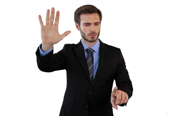 Businessman in suit using invisible interface — Stock Photo, Image