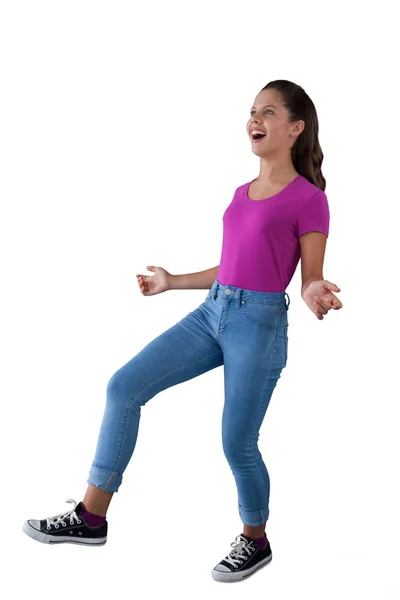 Girl dancing against white background — Stock Photo, Image