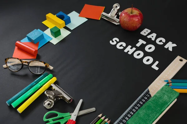 School supplies with text arranged — Stock Photo, Image