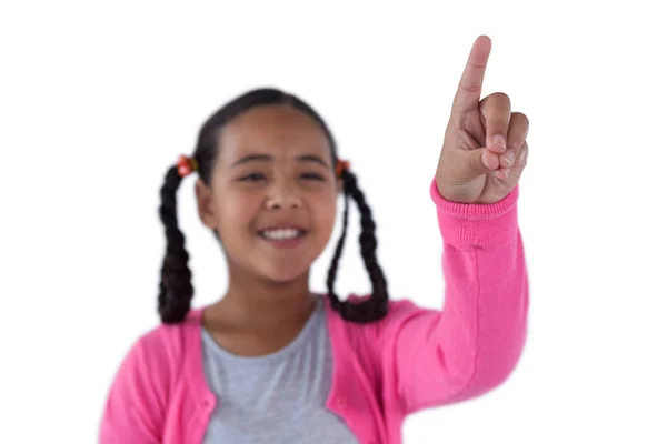 Girl pressing an invisible virtual screen — Stock Photo, Image