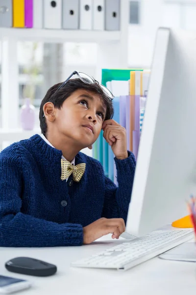 Thoughtful businessman looking up — Stock Photo, Image