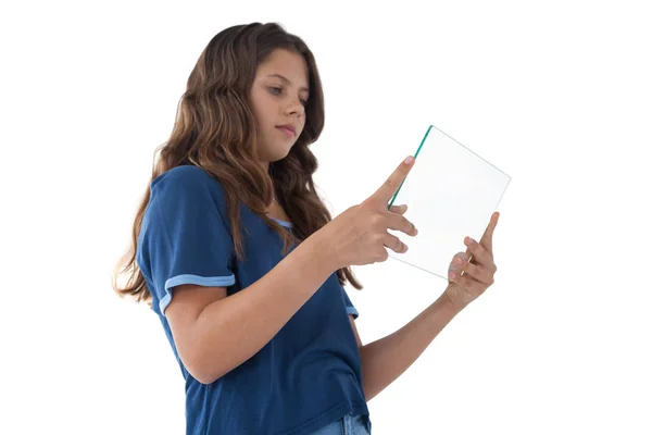 Girl using a glass digital tablet — Stock Photo, Image