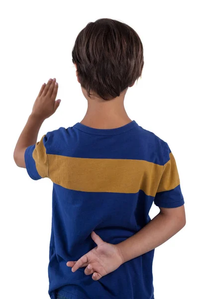 Boy raising his hand — Stock Photo, Image