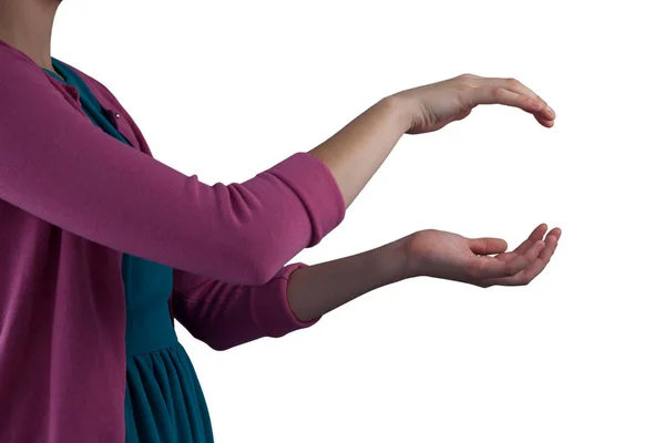 Girl pretending to be hold invisible object — Stock Photo, Image