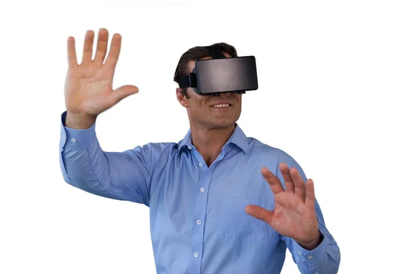 Businessman gesturing while wearing vr glasses — Stock Photo, Image