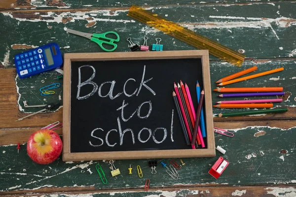 Back to school text written on chalkboard — Stock Photo, Image