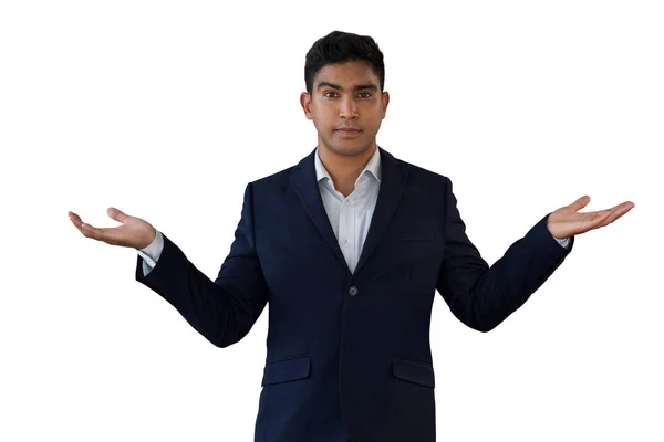 Businessman gesturing while wearing suit — Stock Photo, Image