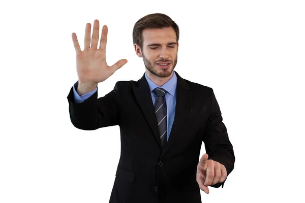 Uomo d'affari sorridente in giacca e cravatta con interfaccia invisibile — Foto Stock