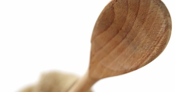 Close-up of raw pasta with wooden spoon — Stock Video