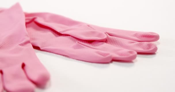 Zbliżenie: różowe rękawiczki — Wideo stockowe