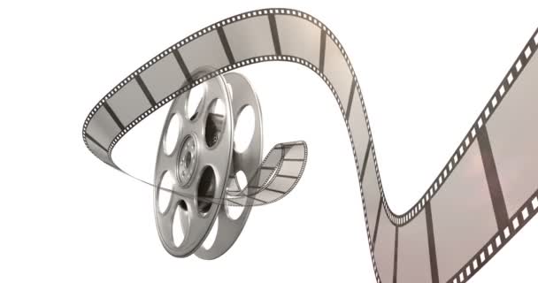 Filme que rola fora de um carretel de filme — Vídeo de Stock