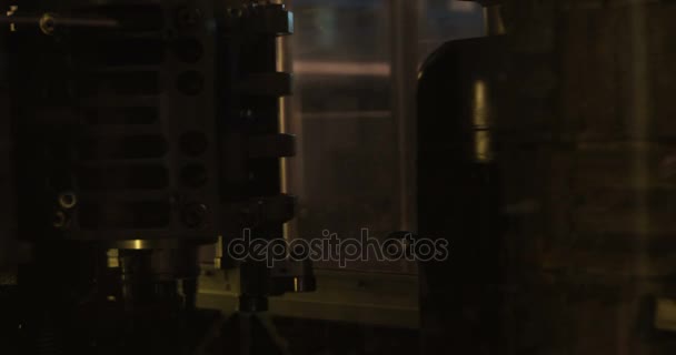 Close-up of bottle filling machinery — Stock Video