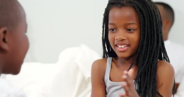 Children playing on bed — Stock Video