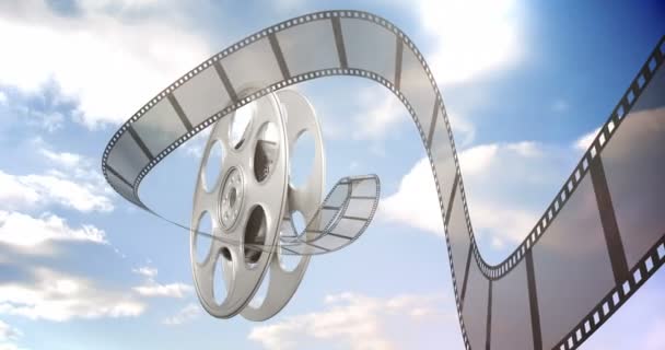 Rotolamento di film da una bobina di film — Video Stock