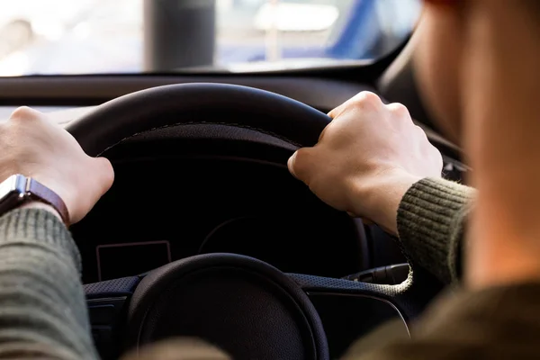 Man holding steering wheel — Stock Photo, Image