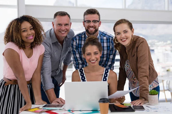 Team of executives working together in the office — Stock Photo, Image