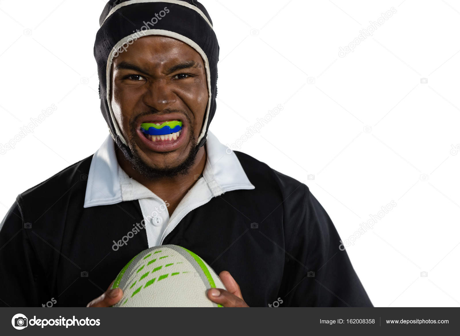 Rugby player wearing mouthguard Stock Photo by Wavebreakmedia