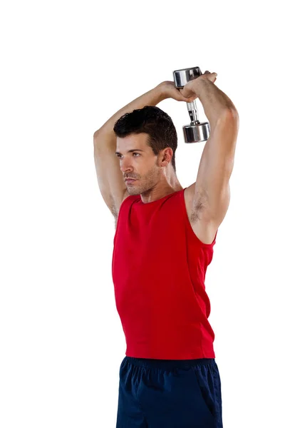 Determined sports player exercising — Stock Photo, Image