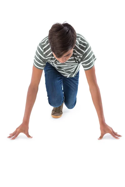 Adolescente menino se preparando para correr — Fotografia de Stock