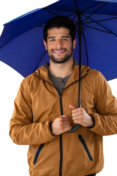 Χαμογελαστός άνθρωπος στέκεται κάτω από την ομπρέλα — Φωτογραφία Αρχείου