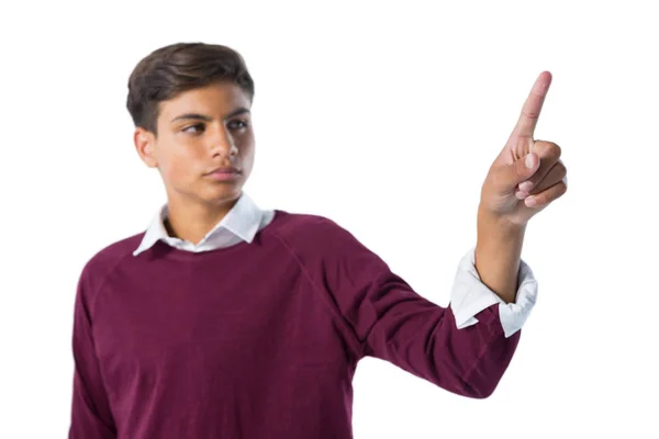 Adolescente ragazzo toccare uno schermo invisibile — Foto Stock