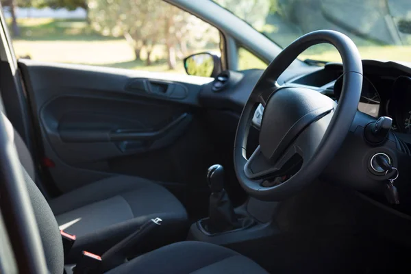 Car interior with steering wheel — Stock Photo, Image