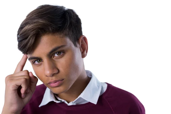 Teenage boy standing against white background — Stock Photo, Image