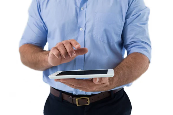 Mid section of male executive using digital tablet — Stock Photo, Image